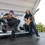 Robert Ross & Mark Dann at the Riverhead Blues Festival in 2010. Steve Holley is in the background. Photo by Eric Fieldstadt.